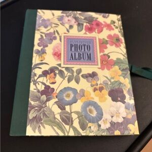 An Old-Fashioned Illustrated Photo Album with Green Binding